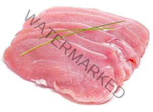 some slices of raw turkey meat on a white background